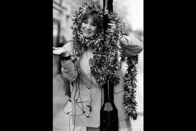 Margot Jacobs, who works at Havant Job Centre, is appealing from traders for Christmas street decorations in 1993. The News PP1976