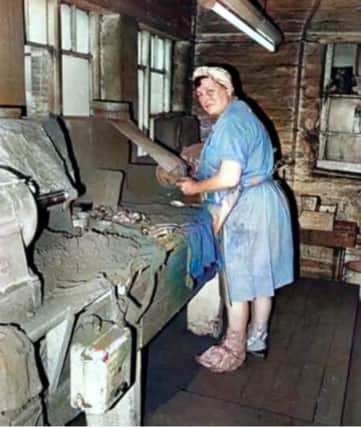 Harriet Dowson in George Butlers buffing shop, you can see the conditions she worked in.