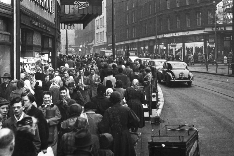 The busy junction of Fargate and High Street with Cole Brothers department store on the right, December 17, 1955
