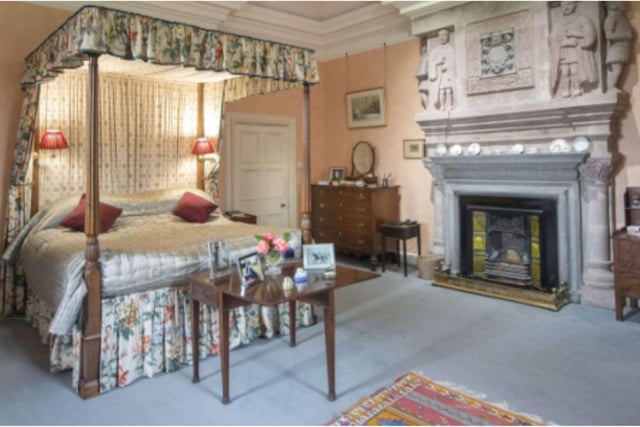 The principal bedroom has extraordinary interior, with many wonderful original features and an intricately carved fireplace for those cold nights.