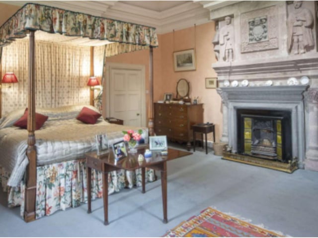 The principal bedroom has extraordinary interior, with many wonderful original features and an intricately carved fireplace for those cold nights.
