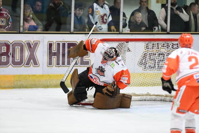Sheffield Steelers' Barry Brust pulls off a save at Guildford