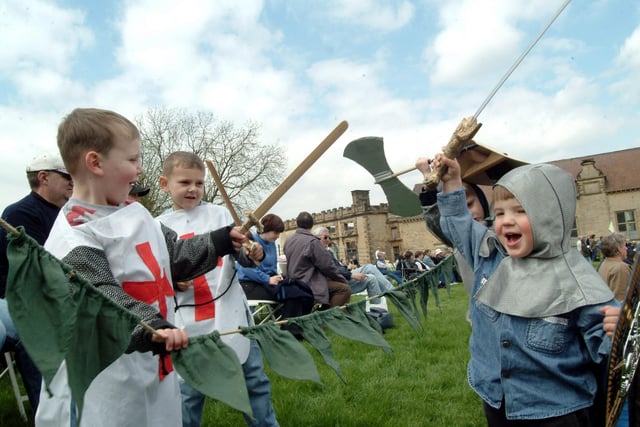 Robin Currie 2 starts his own battle with the Woodvine Knights Edward Woodvine and George Woodvine at The Knights tournament at Bolsover castle in 2006