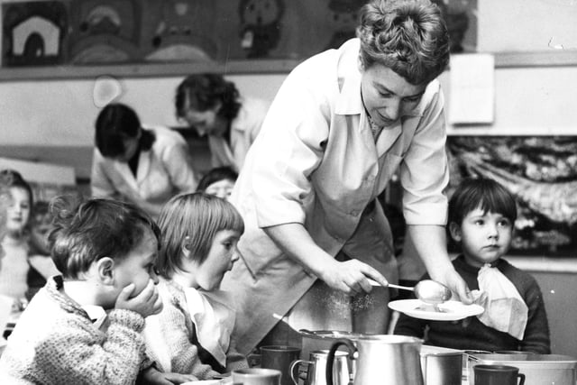 Lunch at Harton Infants School in 1967 and nursery assistant Mrs Tebble is supervising.