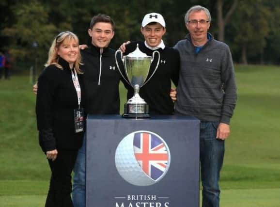 Alex (second from left) pictured with brother Matt, mum Sue and dad Russell after Matt's 2015 British Masters success.
