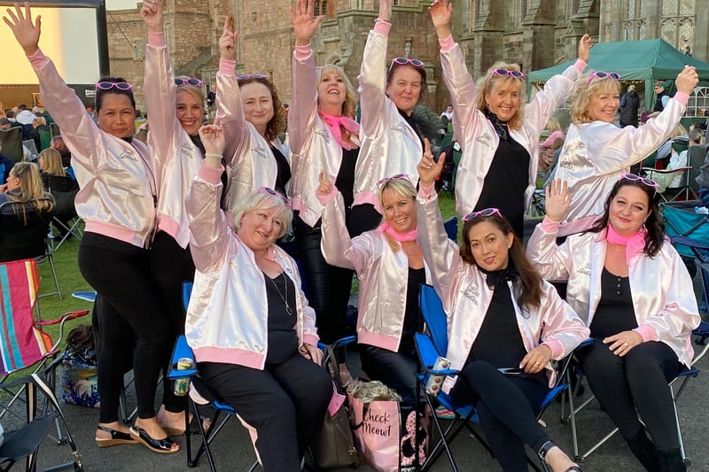 Nurses from Ward 4 of Hexham General Hospital dressed as Pink Ladies for the screening of the musical movie Grease at Bamburgh Castle on Saturday, August 14, 2021.