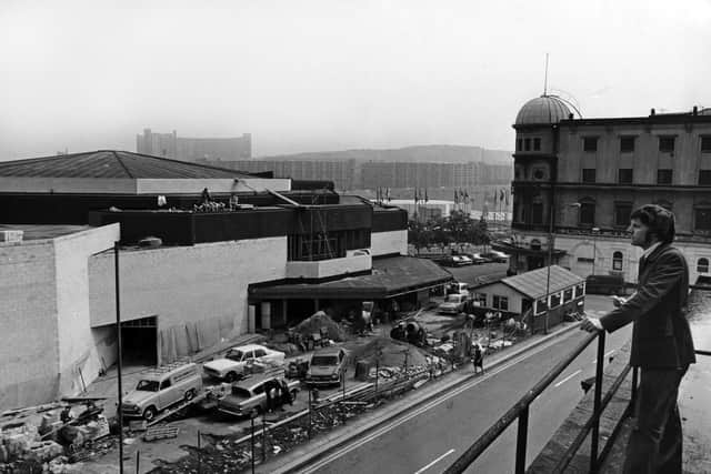 Sheffield Crucible Theatre under construction as the theatre's first artistic director Colin George looks on in July 1971