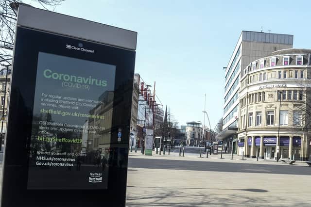 A public service advert about Coronavirus outbreak on Fargate in Sheffield City Centre in place as the UK is in lockdown