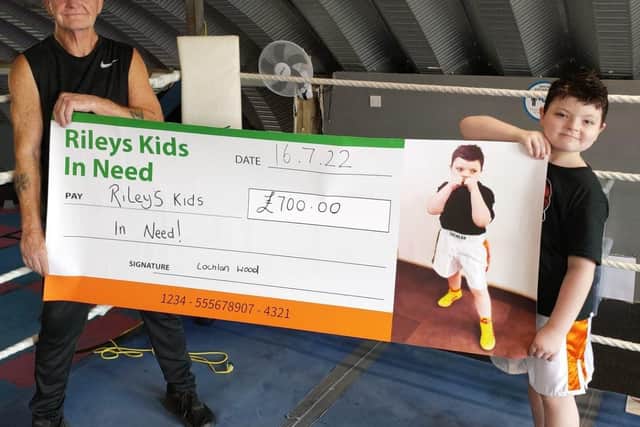 Lochlan has raised £700 through the white collar boxing event.