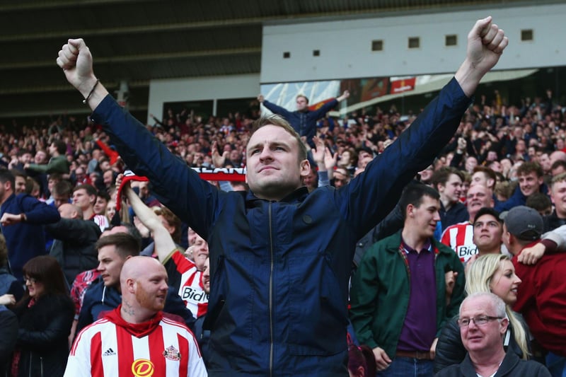 Sunderland supporters celebrate their team's third goal during the Barclays Premier League match between Sunderland and Newcastle United at Stadium of Light.