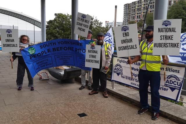 Members of the ADCU union protest against Uber at their Concourse Way base in Sheffield  during the 24 hour strike