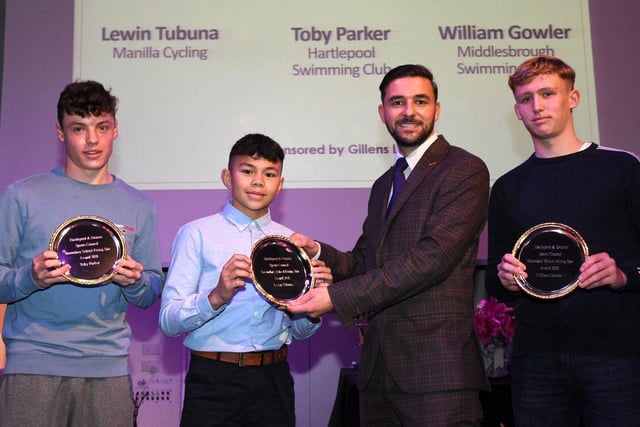Dan Garthwaite, from Hartlepool Borough Council, presents Toby Parker, Lewin Parker and William Gowler with their Secondary School Sports Person of the Year awards.