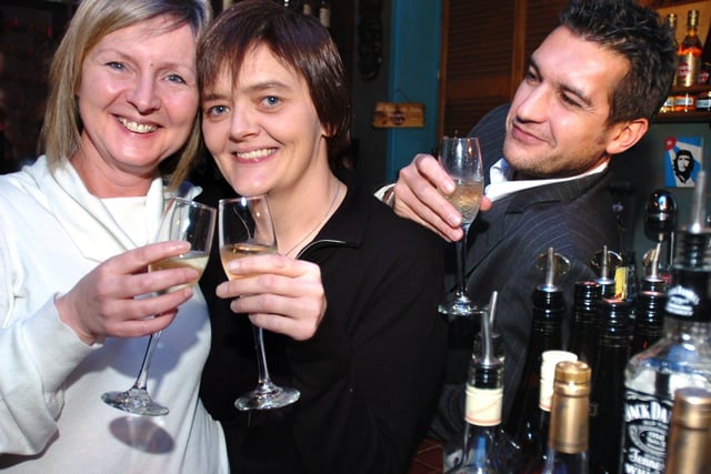 Pictured are Xenia Urwin(left) and Karen Johnson who gotmarried on Valentine's Day  2006 and held their reception at the Cubana Wine bar on Trippet Lane, the couple are pictured with Adrian Bagnioli of the Cubana Bar