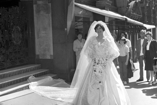 Two days after the Royal Wedding, copies of Princess Diana's wedding dress were on sale at Jenners department store in Edinburgh. Picture of model Karen Stead in Princes Street taken 31st July 1981.
