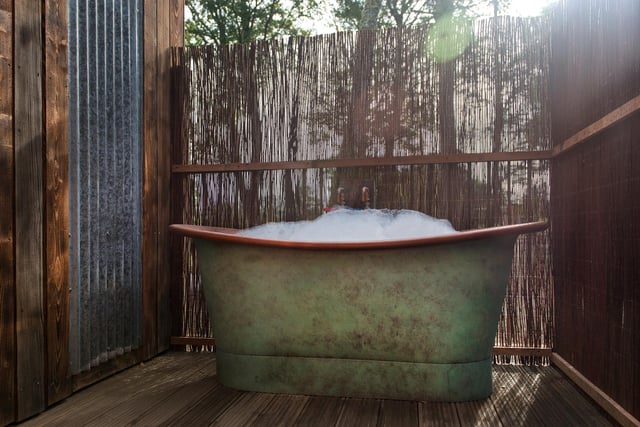 Copper baths have been installed on the porch of each treehouse to allow guests to enjoy a warm dip outside. "Even though the weather is a bit cold at the moment, you can sit and enjoy a warm bath outside while listening to the birds and admiring the beautiful forest around you," Louisa said, "and we chose copper because we love the aesthetic and they also last a long time."