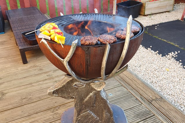 Burgers can be cooked to perfection in this bespoke stag's head barbecue