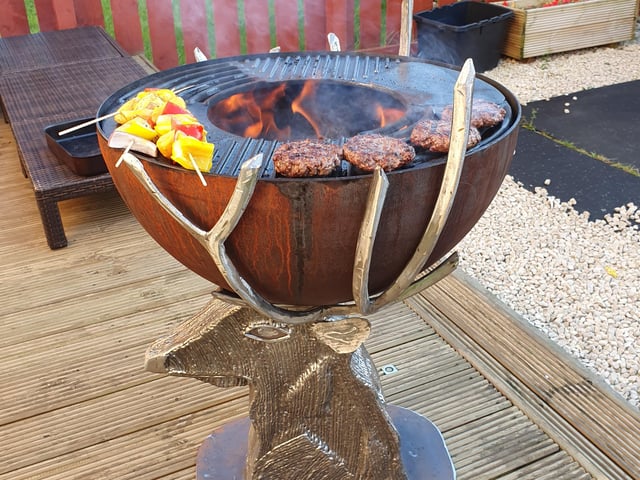 Burgers can be cooked to perfection in this bespoke stag's head barbecue