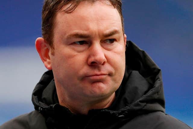 Morecambe manager Derek Adams bemoaned refereeing decisions after their defeat at Sheffield Wednesday.
