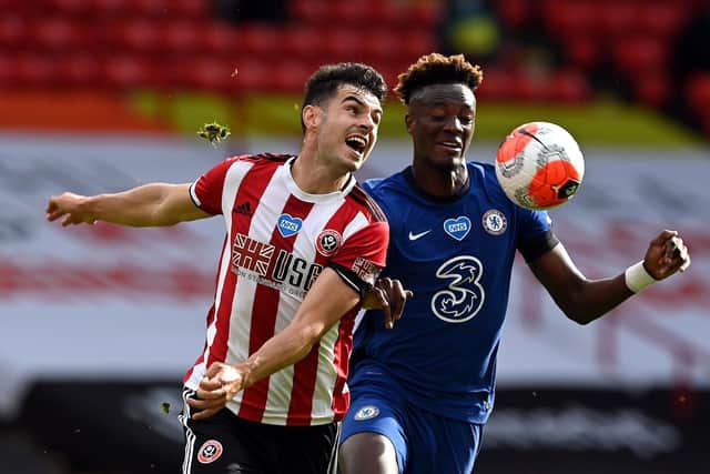 Sheffield United's John Egan (left) has signed a new long term contract with the Premier League club: Shaun Botterill/NMC Pool/PA Wire