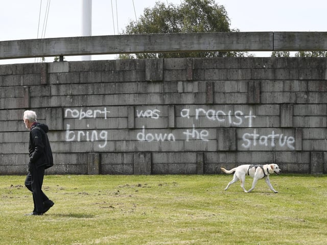 Writing sprayed onto the stone rotunda at the Stirlingshire site reads: “Robert was a racist, bring down the statue.”