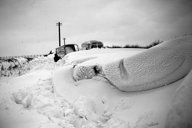 Back in 1963, the Wearside snow was lying 10ft deep in places and this photo shows a bus and a van which had been stuck in the drifts for days.