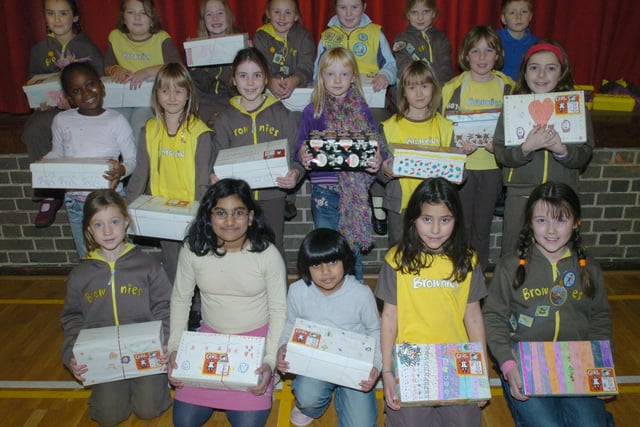 The 20th St Andew's Brownie group seen with their Christmas Shoe boxes that they have produced for operation Christmas Child in 2005