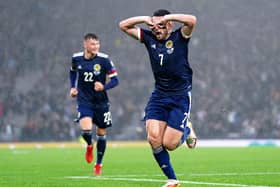 Scotland's John McGinn celebrates scoring their side's first goal of the game during the FIFA World Cup Qualifying match at Hampden Park, Glasgow. Jane Barlow/PA Wire.