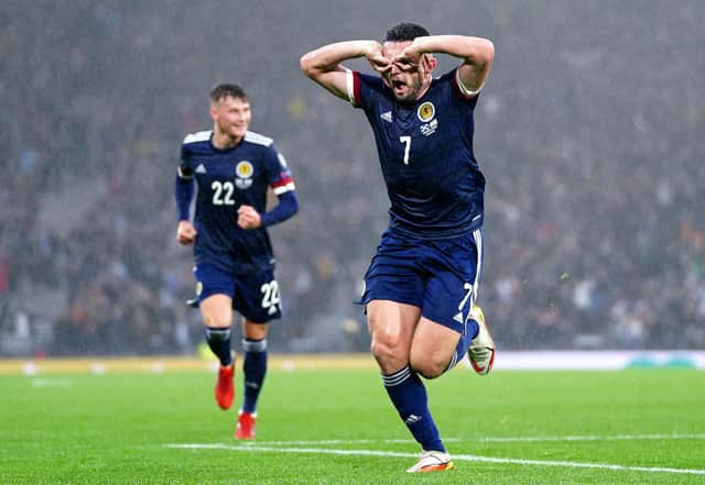 Scotland's John McGinn celebrates scoring their side's first goal of the game during the FIFA World Cup Qualifying match at Hampden Park, Glasgow. Jane Barlow/PA Wire.
