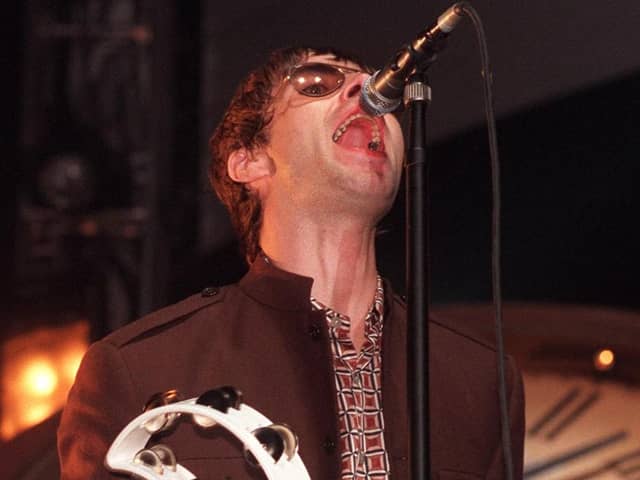 Liam Gallagher on stage at Sheffield Arena in 1997. Picture: Dean Atkins.