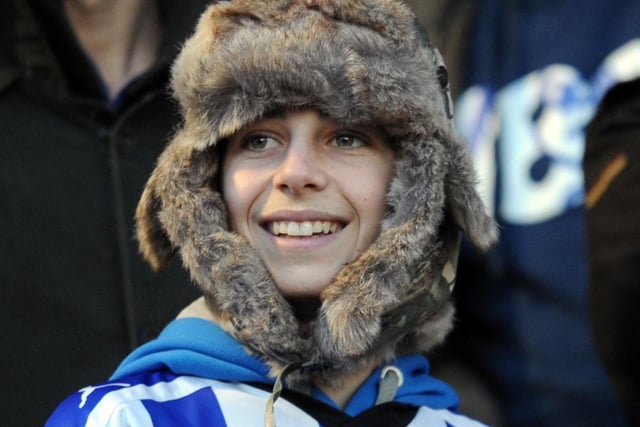 A young Sheffield Wednesday fan cheering on the Owls against Barnsley in 2010