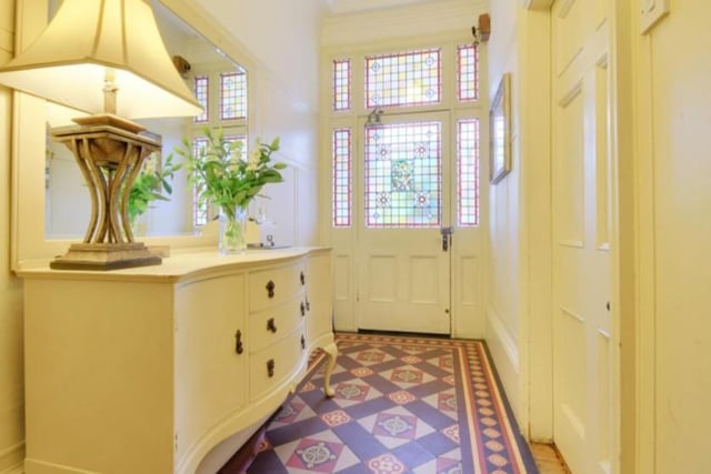 The entrance hallway features with a beautiful tiled floor. 
Image by Peter Heron/ Zoopla.