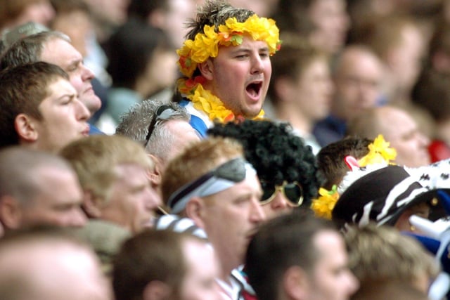Wednesday fans were in fine voice and decked out in a variety of colourful outfits for their side's game at Derby County on April 30, 2006.