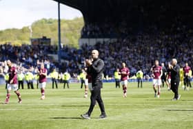 Derby County manager Paul Warne applauds the fans after defeat by Sheffield Wednesday. (Richard Sellers/PA Wire)