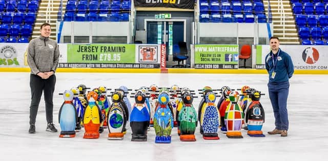 The newly-decorated waddle of penguins at iceSheffield with David Bly, sports programme and engagement manager at SCT and Ryan Ruddiforth, programme supervisor, iceSheffield