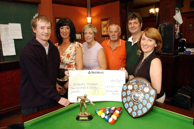 A 2003 memory of the pub's pool team but who can tell us more?