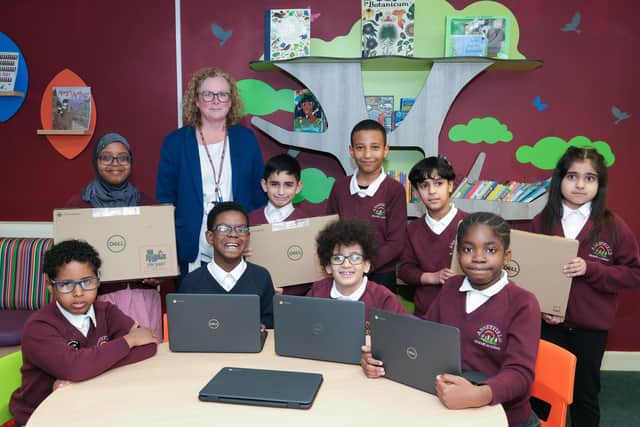 Pupils at Abbeyfield primary School  with their new Chromebooks. They are one of 23 schools tor receive devices this week to drive down the digital divide.