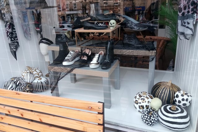 The black and white themed Halloween window at Robinson's on Bondgate Within.