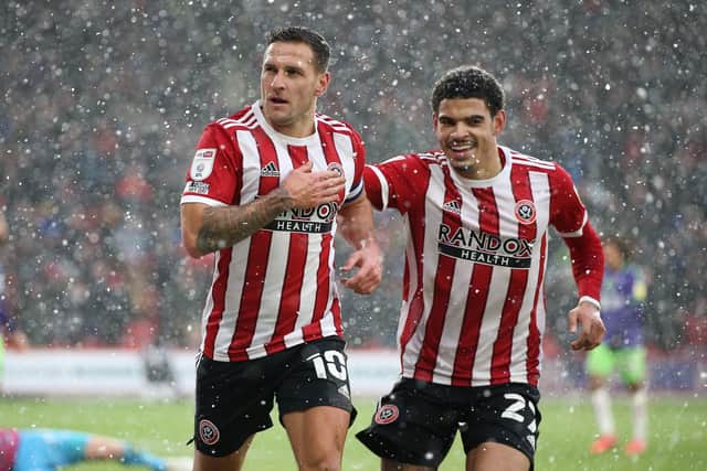 Goalscorer,  Billy Sharp of Sheffield United and Morgan Gibbs-White celebrate during the Sky Bet Championship match at Bramall Lane, Sheffield: Alistair Langham / Sportimage