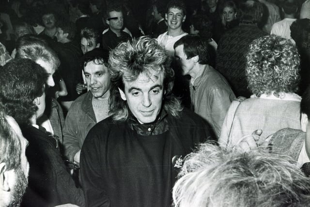 Peter Stringfellow with friends during the King Mojo Christmas party held at the Leadmill, Sheffield, December 1984