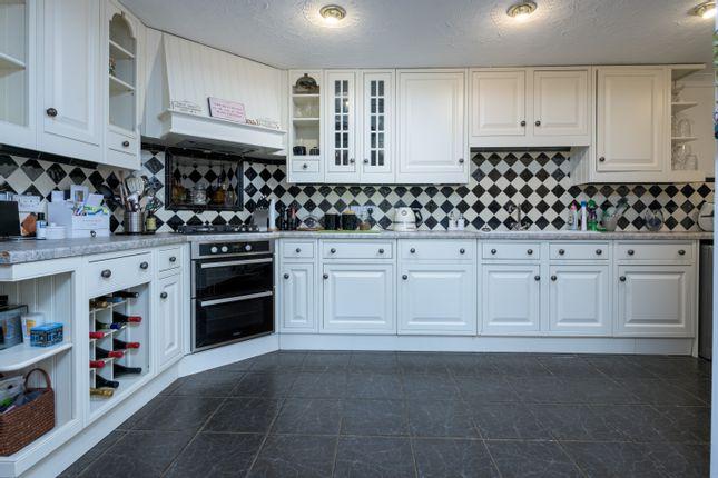 The main part of the house boasts a large and charming kitchen.