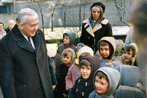 The then Prime Minister Harold Wilson pauses to talk to children from Parkhill Junior and Infants School, outside the Grace Owen Nursery School, Parkill, in January 1970