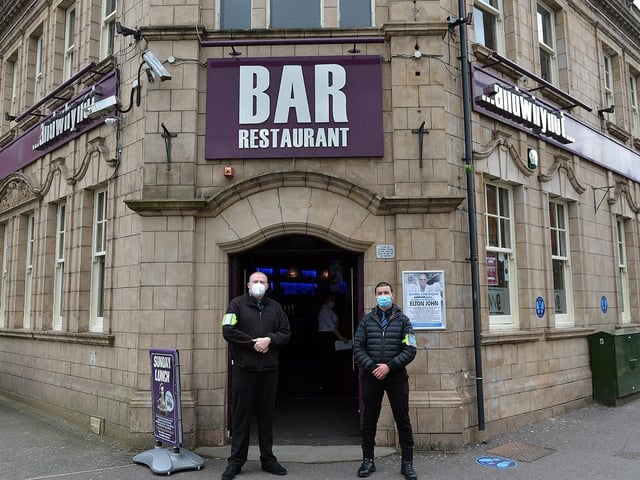 Masked security men.