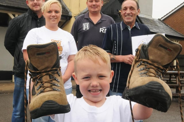 Four-year-old Kian Butler was ready to do a charity walk back in 2011 pictured are Karl Butler landlord, Deborah Butler, Robert Deakin Broardmeadows and Eric Butler Grandad