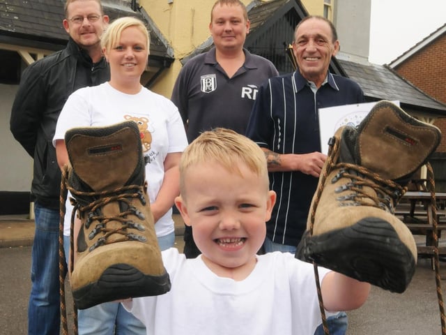 Four-year-old Kian Butler was ready to do a charity walk back in 2011 pictured are Karl Butler landlord, Deborah Butler, Robert Deakin Broardmeadows and Eric Butler Grandad
