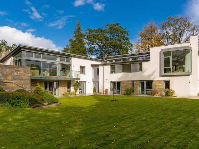 Substantial, modern property of architectural merit with fantastic light filled spaces and a beautiful garden. Offers over £2,000,000.