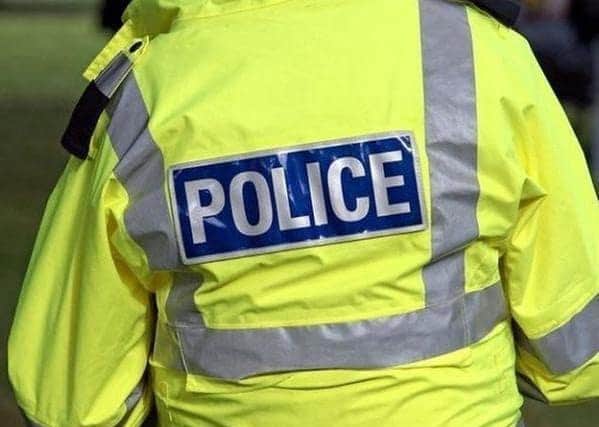 A man has been arrested after he allegedly threatened people with an axe during a series of robberies in Sheffield city centre.