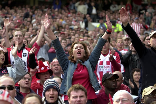 Sheffield United fans cheer their team on at the FA Cup semi final against Arsenal in 2003