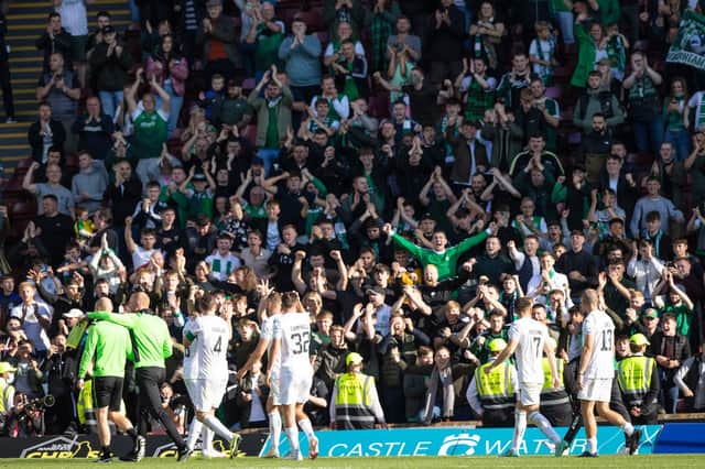 Hibs players celebrate in front of the travelling fans after Sunday's 3-2 win over Motherwell. (Photo by Craig Williamson / SNS Group)
