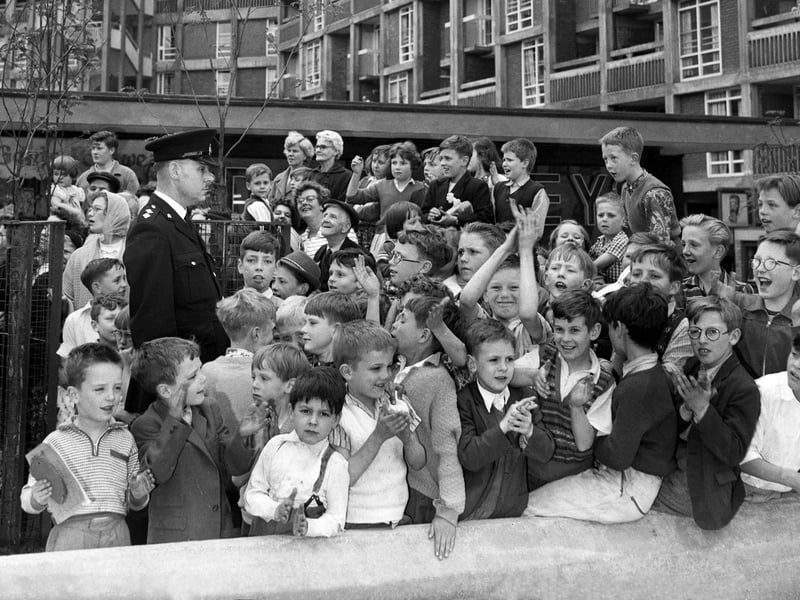 Children wait for the former Labour Leader, Hugh Gaitskell, to arrive for the official opening of the Park Hill Flats complex, Sheffield, on June 16, 1961