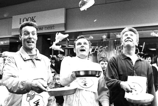 A victory toss from the winning team of Frank Blair, Ron Williams and Graham Atkinson in the 1990 race.